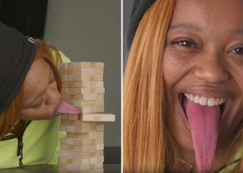 A dona da língua mais longa do mundo ( quase 10 cm )