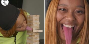 A dona da língua mais longa do mundo ( quase 10 cm )